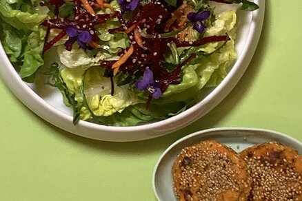 Viola spring salad with violet vinegar and sweet potato taler