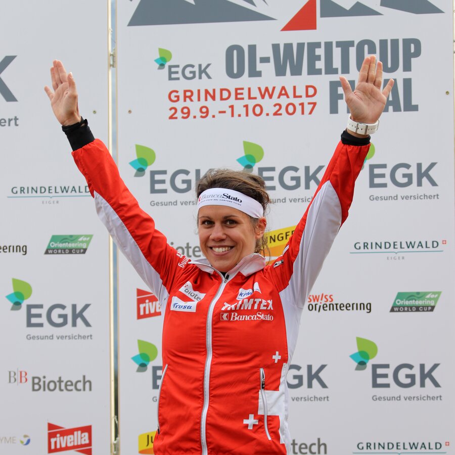 Orienteer Elena Howald-Roos with raised hands