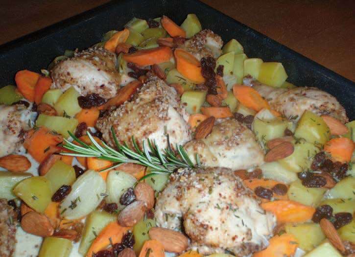 Poulet pané aux amandes et légumes sur plaque