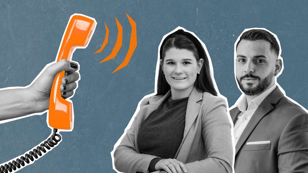 Female and male EGK advisors with telephone receiver